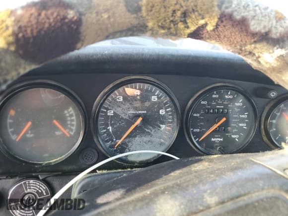 ✅ 1991 Porsche 911 • VIN: WP0AB2964MS411168 • Lot: 75928974. Wystawiony na Copart z przebiegiem 141 731 mil. Bezpłatny archiwum sprzedaży aukcyjnych z USA i szczegółowy raport historii pojazdu na DreamBid. Zdjęcie 9.