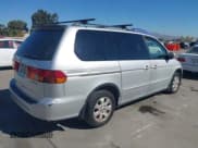 ✅ 2003 Honda Odyssey EX-L • VIN: 5FNRL18093B119471 • Лот: 43494528. Опубликован ранее на IAAI с пробегом 284 686 миль. Бесплатный доступ к архиву аукционных продаж из США и подробный отчёт об истории автомобиля на DreamBid. Изображение 4.