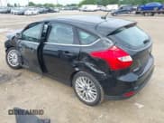 ✅ 2014 Ford Focus Titanium • VIN: 1FADP3N25EL194433 • Lot: 42512912. Listed on IAAI with 105,355 mi. Free auction sales archive from the USA and detailed vehicle history report at DreamBid. Image 3.