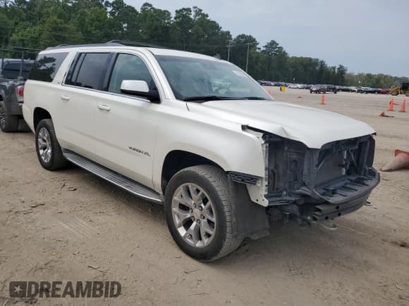 ✅ 2015 GMC Yukon XL SLT • VIN: 1GKS1HKC4FR240785 • Lot: 70176695. Listed on Copart with 231,974 mi. Free auction sales archive from the USA and detailed vehicle history report at DreamBid. Image 4.
