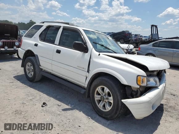 ✅ 2001 Isuzu Rodeo S • VIN: 4S2CK58W514313783 • Lot: 63038984. Listed on Copart with 179,628 mi. Free auction sales archive from the USA and detailed vehicle history report at DreamBid. Image 4.