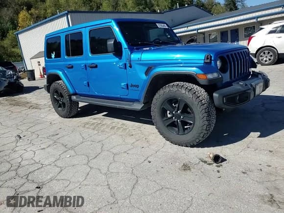 ✅ 2022 Jeep Wrangler Unlimited Sahara Altitude • VIN: 1C4HJXEGXNW105521 • Lot: 87063465. Listed on Copart with 86,243 mi. Free auction sales archive from the USA and detailed vehicle history report at DreamBid. Image 14.