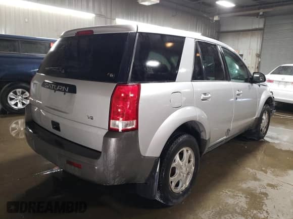 2004 Saturn VUE V6 z VIN 5GZCZ53414S889642, wystawiony jako Copart lot #76753124 z przebiegiem 161 835 mil mil oraz Szkoda całkowita • Salvage title. Historia ofert i sprzedaży dostępna na DreamBid. Obrazek 3.