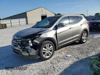 ✅ 2015 Hyundai Santa Fe • VIN: 5XYZWDLA7FG239808 • Лот: 80452375. Опубликован ранее на Copart с пробегом 128 952 миль. Бесплатный доступ к архиву аукционных продаж из США и подробный отчёт об истории автомобиля на DreamBid. Изображение 1.