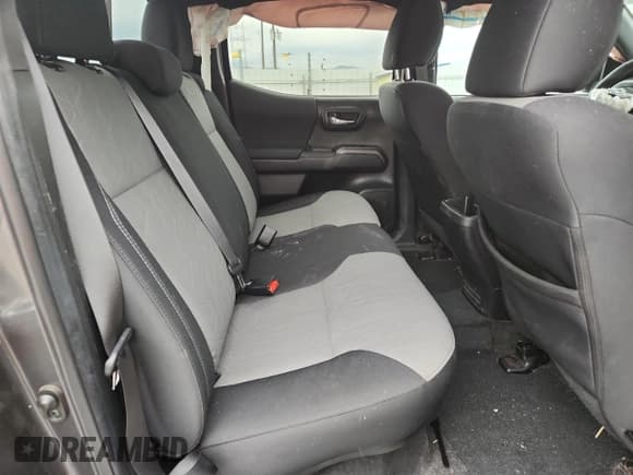 ✅ 2023 Toyota Tacoma TRD Sport • VIN: 3TMCZ5AN1PM557548 • Лот: 82419795. Опубликован ранее на Copart с пробегом 58 725 миль. Бесплатный доступ к архиву аукционных продаж из США и подробный отчёт об истории автомобиля на DreamBid. Изображение 10.