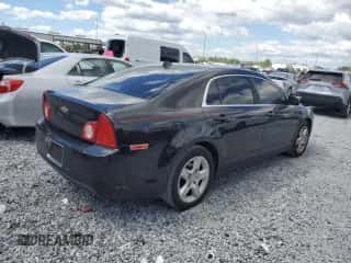 2012 Chevrolet Malibu 1LS z VIN 1G1ZB5E0XCF156340, wystawiony jako Copart lot #86523055 z przebiegiem 121 189 mil mil oraz Szkoda całkowita • Salvage title. Historia ofert i sprzedaży dostępna na DreamBid. Obrazek 3.