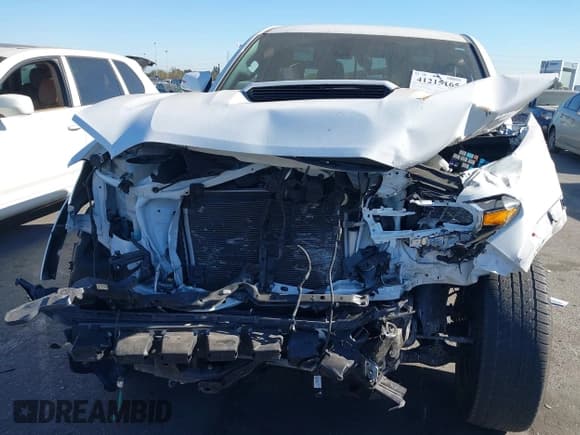 ✅ 2023 Toyota Tacoma SR5 • VIN: 3TMDZ5BN3PM156439 • Lot: 41215165. Listed on IAAI with 25,257 mi. Free auction sales archive from the USA and detailed vehicle history report at DreamBid. Image 6.
