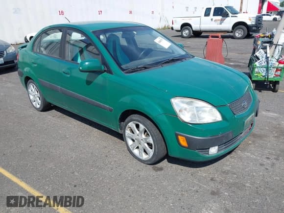 ✅ 2008 Kia Rio LX • VIN: KNADE123486408555 • Лот: 42888797. Опубликован ранее на IAAI с пробегом 89 886 миль. Бесплатный доступ к архиву аукционных продаж из США и подробный отчёт об истории автомобиля на DreamBid. Изображение 1.