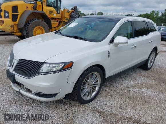 ✅ 2015 Lincoln MKT EcoBoost • VIN: 2LMHJ5AT2FBL03200 • Lot: 42927841. Listed on IAAI with 138,403 mi. Free auction sales archive from the USA and detailed vehicle history report at DreamBid. Image 17.