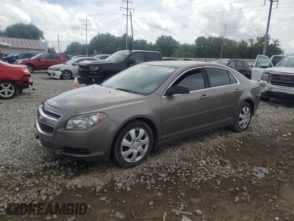 ✅ 2012 Chevrolet Malibu 1LS • VIN: 1G1ZB5E05CF204892 • Lot: 65161234. Listed on Copart with 121,256 mi. Free auction sales archive from the USA and detailed vehicle history report at DreamBid. Image 1.