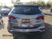 ✅ 2017 Hyundai Santa Fe Ultimate • VIN: 5XYZWDLA0HG502949 • Лот: 70020573. Опубликован ранее на Copart с пробегом 89 786 миль. Бесплатный доступ к архиву аукционных продаж из США и подробный отчёт об истории автомобиля на DreamBid. Изображение 6.