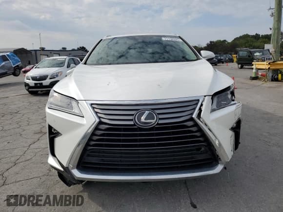 ✅ 2019 Lexus RX 350L Premium • VIN: JTJDZKCA9K2018508 • Lot: 71158325. Wystawiony na Copart z przebiegiem 101 053 mil. Bezpłatny archiwum sprzedaży aukcyjnych z USA i szczegółowy raport historii pojazdu na DreamBid. Zdjęcie 5.