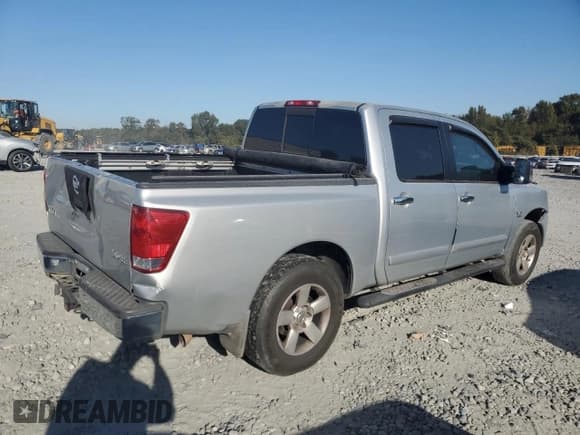 ✅ 2004 Nissan Titan LE • VIN: 1N6AA07A84N591877 • Лот: 89821505. Опубликован ранее на Copart с пробегом 148 922 миль. Бесплатный доступ к архиву аукционных продаж из США и подробный отчёт об истории автомобиля на DreamBid. Изображение 3.