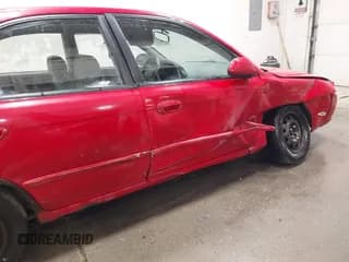 ✅ 2003 Kia Spectra GS • VIN: KNAFB161035115874 • Лот: 42179809. Опубликован ранее на IAAI с пробегом 127 594 миль. Бесплатный доступ к архиву аукционных продаж из США и подробный отчёт об истории автомобиля на DreamBid. Изображение 6.