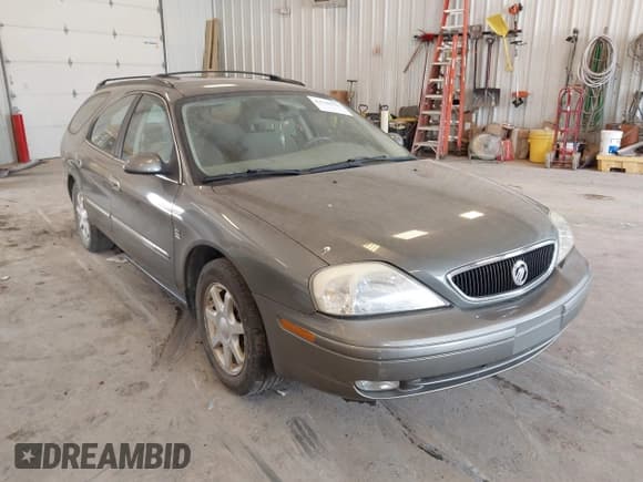 ✅ 2003 Mercury Sable LS Premium • VIN: 1MEHM59S73A620690 • Lot: 42740596. Listed on IAAI with 92,891 mi. Free auction sales archive from the USA and detailed vehicle history report at DreamBid. Image 1.