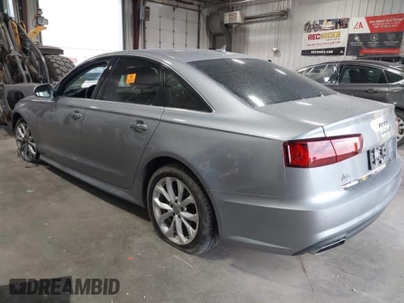 ✅ 2017 Audi A6 Prestige • VIN: WAUH2AFC1HN081865 • Лот: 42733164. Опубликован ранее на IAAI с пробегом 56 750 миль. Бесплатный доступ к архиву аукционных продаж из США и подробный отчёт об истории автомобиля на DreamBid. Изображение 3.