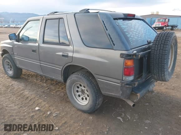 ✅ 1995 Isuzu Rodeo LS • VIN: 4S2CY58V1S4341166 • Lot: 43620703. Listed on IAAI with 239,588 mi. Free auction sales archive from the USA and detailed vehicle history report at DreamBid. Image 3.