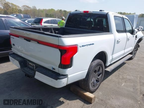 ✅ 2023 Ford F-150 Lightning Pro • VIN: 1FTVW1EV1PWG17610 • Lot: 41929636. Listed on IAAI with 44,428 mi. Free auction sales archive from the USA and detailed vehicle history report at DreamBid. Image 4.
