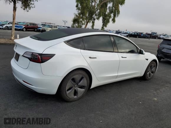 ✅ 2023 Tesla Model 3 Long Range • VIN: 5YJ3E1EB5PF477825 • Лот: 86324685. Опубликован ранее на Copart с пробегом 96 486 миль. Бесплатный доступ к архиву аукционных продаж из США и подробный отчёт об истории автомобиля на DreamBid. Изображение 3.