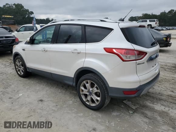 ✅ 2015 Ford Escape Titanium • VIN: 1FMCU0J92FUA87685 • Lot: 90396065. Wystawiony na Copart z przebiegiem 216 520 mil. Bezpłatny archiwum sprzedaży aukcyjnych z USA i szczegółowy raport historii pojazdu na DreamBid. Zdjęcie 2.