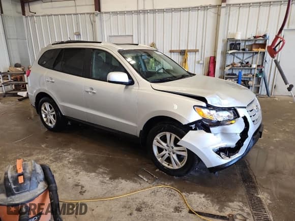 ✅ 2011 Hyundai Santa Fe Limited • VIN: 5XYZKDAG2BG041067 • Lot: 82503735. Listed on Copart with 139,704 mi. Free auction sales archive from the USA and detailed vehicle history report at DreamBid. Image 4.