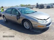 ✅ 1999 Chrysler Concorde • VIN: 2C3HD46J4XH737517 • Lot: 41919869. Listed on IAAI with 514,890 mi. Free auction sales archive from the USA and detailed vehicle history report at DreamBid. Image 1.