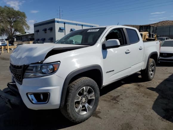 ✅ 2016 Chevrolet Colorado 4WD Z71 • VIN: 1GCGTDE30G1358400 • Лот: 74707354. Опубликован ранее на Copart с пробегом 128 966 миль. Бесплатный доступ к архиву аукционных продаж из США и подробный отчёт об истории автомобиля на DreamBid. Изображение 1.