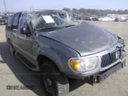 ✅ 2000 Mercury Mountaineer • VIN: 4M2ZU66E9YUJ34781 • Lot: 21776040. Wystawiony na IAAI z przebiegiem 128 003 mil. Bezpłatny archiwum sprzedaży aukcyjnych z USA i szczegółowy raport historii pojazdu na DreamBid. Zdjęcie 1.