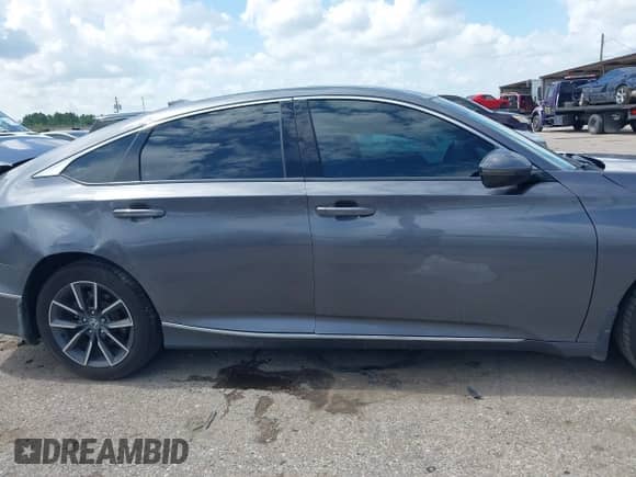 2022 Honda Accord EX-L z VIN 1HGCV1F56NA028850, wystawiony jako IAAI lot #42646990 z przebiegiem 38 006 mil mil oraz . Historia ofert i sprzedaży dostępna na DreamBid. Obrazek 13.