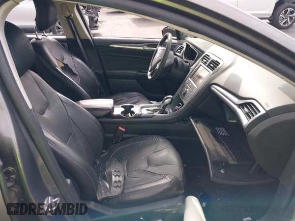 ✅ 2014 Ford Fusion Titanium • VIN: 3FA6P0SU6ER256582 • Lot: 42338547. Listed on IAAI with 146,550 mi. Free auction sales archive from the USA and detailed vehicle history report at DreamBid. Image 5.