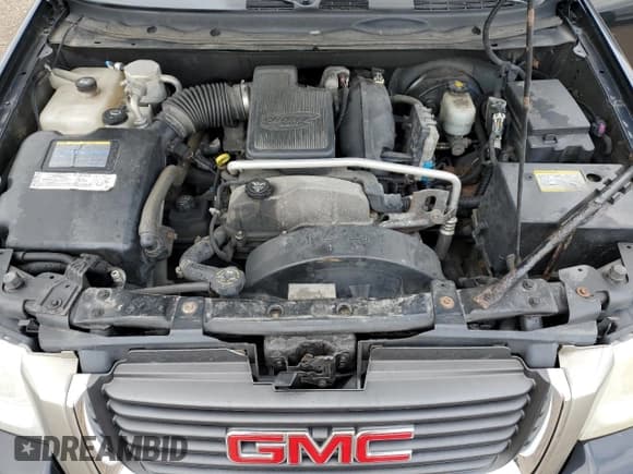 ✅ 2006 GMC Envoy SLT • VIN: 1GKDT13S562152093 • Lot: 81571005. Listed on Copart with 256,169 mi. Free auction sales archive from the USA and detailed vehicle history report at DreamBid. Image 12.