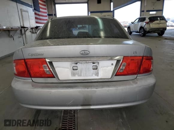 ✅ 2003 Kia Optima LX • VIN: KNAGD126335211255 • Лот: 60637665. Опубликован ранее на Copart с пробегом Не указан. Бесплатный доступ к архиву аукционных продаж из США и подробный отчёт об истории автомобиля на DreamBid. Изображение 6.