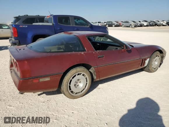 1986 Chevrolet Corvette with VIN 1G1YY0789G5118657, listed as a Copart auction lot 77743794 with 97,673 mi miles and Salvage title. Bid and sale history available at DreamBid. Image 3.