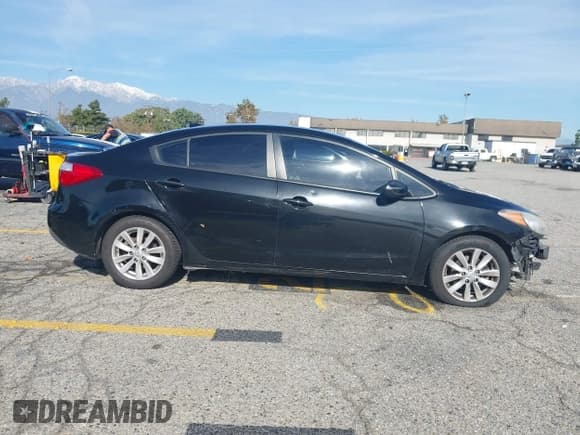 ✅ 2016 Kia Forte LX • VIN: KNAFX4A69G5444262 • Lot: 43765922. Listed on IAAI with 142,059 mi. Free auction sales archive from the USA and detailed vehicle history report at DreamBid. Image 14.