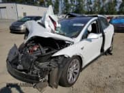 ✅ 2020 Tesla Model X Long Range • VIN: 5YJXCAE26LF239810 • Lot: 60548712. Listed on Copart with Not provided. Free auction sales archive from the USA and detailed vehicle history report at DreamBid. Image 2.