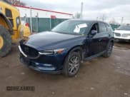 ✅ 2018 Mazda CX-5 Grand Touring • VIN: JM3KFBDM5J0426677 • Lot: 43579829. Listed on IAAI with 94,077 mi. Free auction sales archive from the USA and detailed vehicle history report at DreamBid. Image 2.