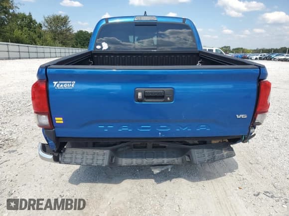 ✅ 2018 Toyota Tacoma SR5 • VIN: 5TFAZ5CN7JX065614 • Лот: 84872725. Опубликован ранее на Copart с пробегом 127 334 миль. Бесплатный доступ к архиву аукционных продаж из США и подробный отчёт об истории автомобиля на DreamBid. Изображение 6.