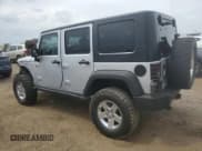 ✅ 2010 Jeep Wrangler Unlimited Rubicon • VIN: 1J4BA6H17AL178231 • Лот: 66706055. Опубликован ранее на Copart с пробегом 112 981 миль. Бесплатный доступ к архиву аукционных продаж из США и подробный отчёт об истории автомобиля на DreamBid. Изображение 2.