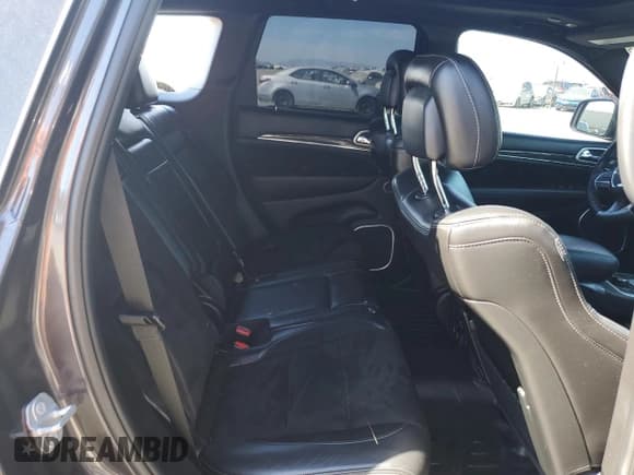 ✅ 2018 Jeep Grand Cherokee SRT • VIN: 1C4RJFDJ8JC488401 • Лот: 68311635. Опубликован ранее на Copart с пробегом 37 512 миль. Бесплатный доступ к архиву аукционных продаж из США и подробный отчёт об истории автомобиля на DreamBid. Изображение 10.