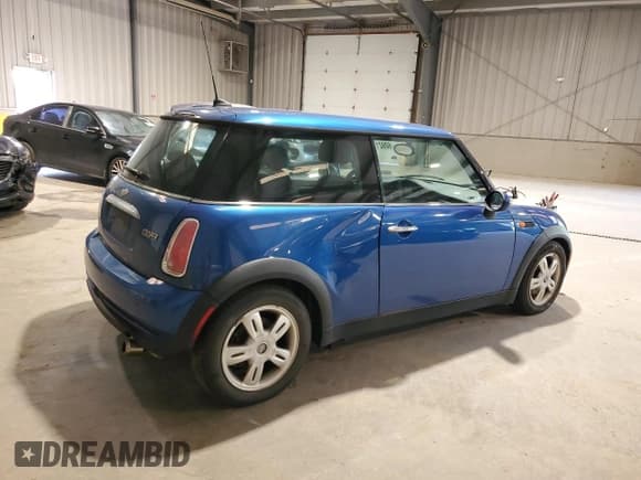 ✅ 2006 MINI Hardtop • VIN: WMWRC33506TJ77806 • Lot: 60921115. Listed on Copart with 86,927 mi. Free auction sales archive from the USA and detailed vehicle history report at DreamBid. Image 3.