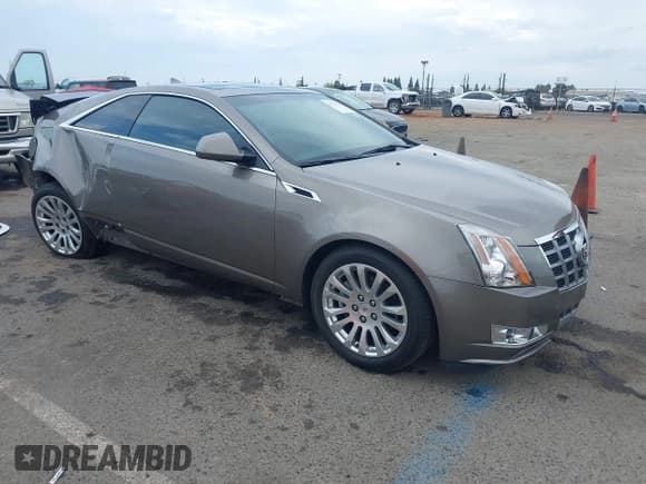 ✅ 2012 Cadillac CTS Performance • VIN: 1G6DK1E32C0136464 • Lot: 43516770. Listed on IAAI with 44,970 mi. Free auction sales archive from the USA and detailed vehicle history report at DreamBid. Image 1.
