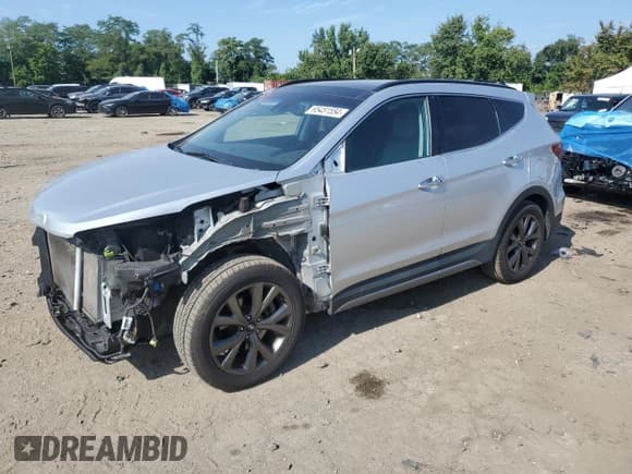 ✅ 2017 Hyundai Santa Fe Ultimate • VIN: 5XYZW4LA1HG475678 • Lot: 65451554. Wystawiony na Copart z przebiegiem 77 173 mil. Bezpłatny archiwum sprzedaży aukcyjnych z USA i szczegółowy raport historii pojazdu na DreamBid. Zdjęcie 1.