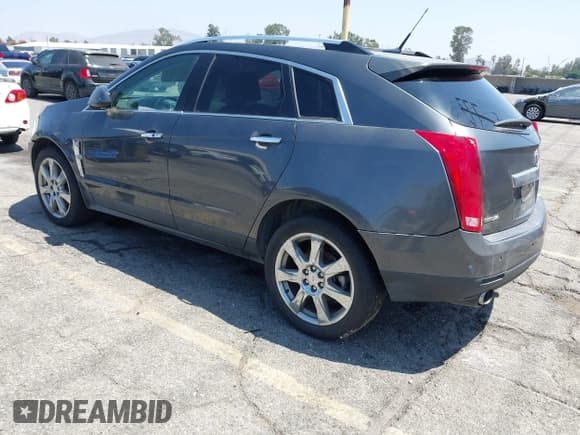 ✅ 2010 Cadillac SRX Premium Collection • VIN: 3GYFNCEY1AS652920 • Lot: 42795496. Listed on IAAI with 185,086 mi. Free auction sales archive from the USA and detailed vehicle history report at DreamBid. Image 3.