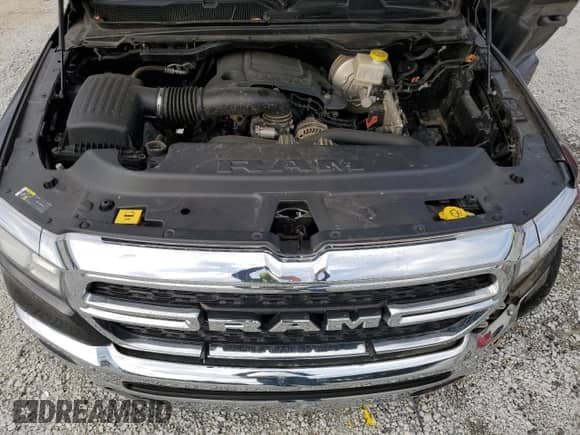 2020 Ram 1500 Tradesman z VIN 1C6RREGTXLN237345, wystawiony jako Copart lot #71566015 z przebiegiem 69 685 mil mil oraz Szkoda całkowita • Salvage title. Historia ofert i sprzedaży dostępna na DreamBid. Obrazek 11.