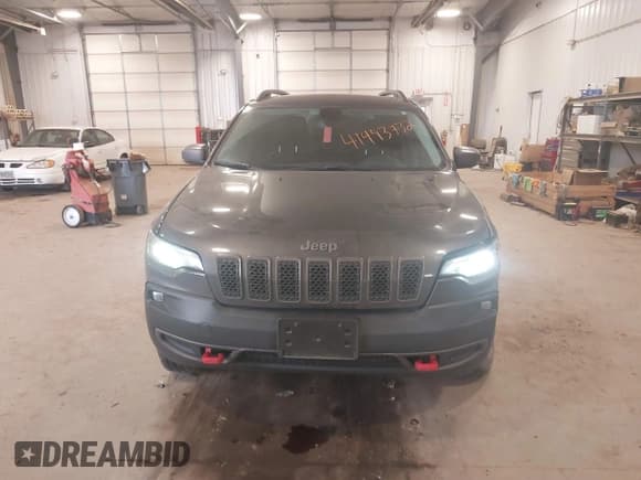 ✅ 2020 Jeep Cherokee Trailhawk • VIN: 1C4PJMBX8LD627104 • Лот: 41493732. Опубликован ранее на IAAI с пробегом 46 463 миль. Бесплатный доступ к архиву аукционных продаж из США и подробный отчёт об истории автомобиля на DreamBid. Изображение 12.