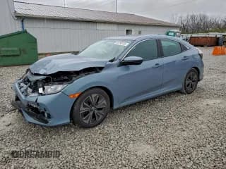 ✅ 2018 Honda Civic EX • VIN: SHHFK7H51JU214929 • Lot: 93738785. Wystawiony na Copart z przebiegiem 76 099 mil. Bezpłatny archiwum sprzedaży aukcyjnych z USA i szczegółowy raport historii pojazdu na DreamBid. Zdjęcie 1.