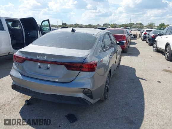 ✅ 2023 Kia Forte LXS • VIN: 3KPF24AD2PE606561 • Lot: 43400482. Listed on IAAI with 61,935 mi. Free auction sales archive from the USA and detailed vehicle history report at DreamBid. Image 4.