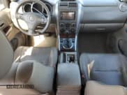 ✅ 2007 Suzuki Grand Vitara Luxury • VIN: JS3TE947874200932 • Lot: 72956984. Wystawiony na Copart z przebiegiem 223 421 mil. Bezpłatny archiwum sprzedaży aukcyjnych z USA i szczegółowy raport historii pojazdu na DreamBid. Zdjęcie 8.