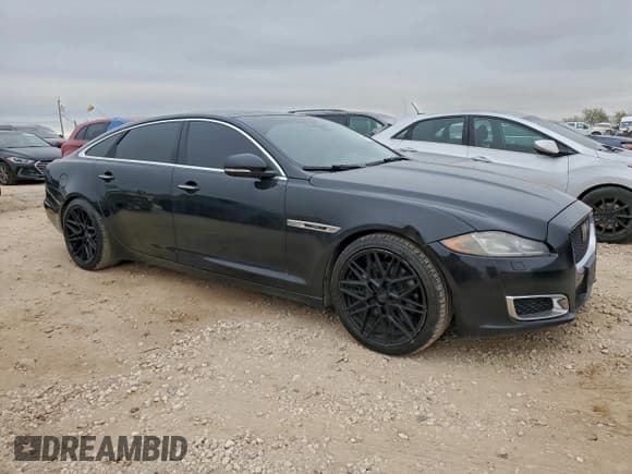 ✅ 2019 Jaguar XJ Portfolio • VIN: SAJWA2G76K8W20136 • Lot: 94327475. Listed on Copart with 144,134 mi. Free auction sales archive from the USA and detailed vehicle history report at DreamBid. Image 4.