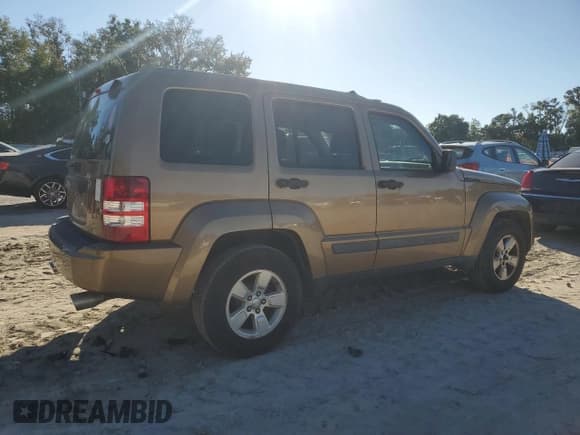 ✅ 2012 Jeep Liberty Sport • VIN: 1C4PJMAK9CW134719 • Lot: 85423565. Listed on Copart with 136,990 mi. Free auction sales archive from the USA and detailed vehicle history report at DreamBid. Image 3.